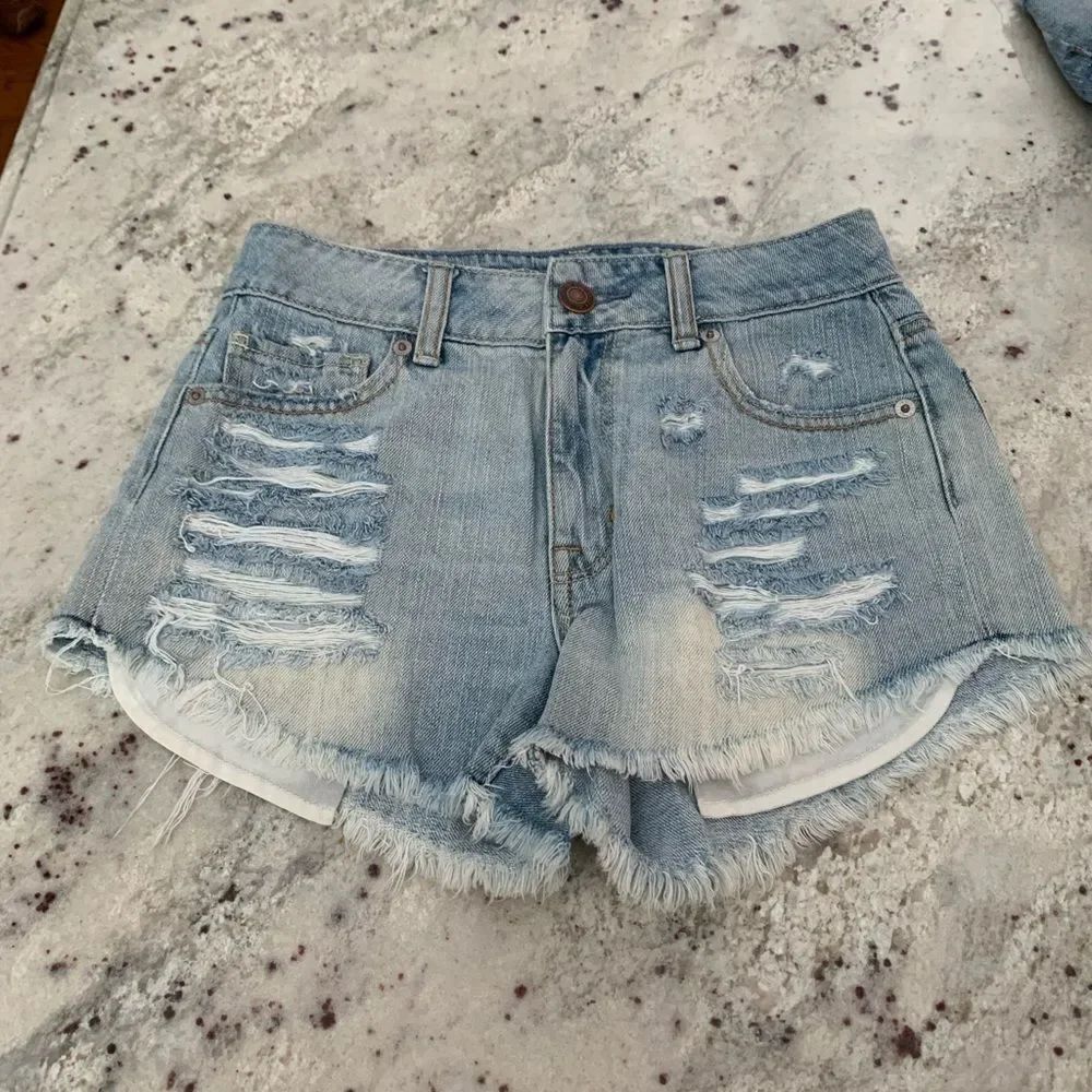 AEO Hi-Rise Festival X-Tra Destroyed Denim Shorts